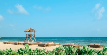 a small hut on a beach