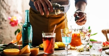 a person holding a glass of wine