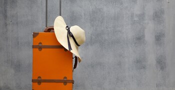 a pair of orange and white surfboards